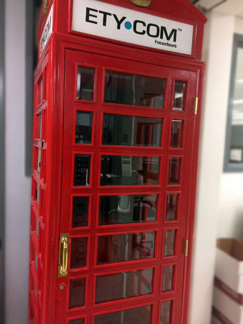 This phone booth is a tradeshow exhibit used by Etymotic to showcase their Ety Com headset, which let users make phone calls in noisy environments and still be heard by those on the other line.