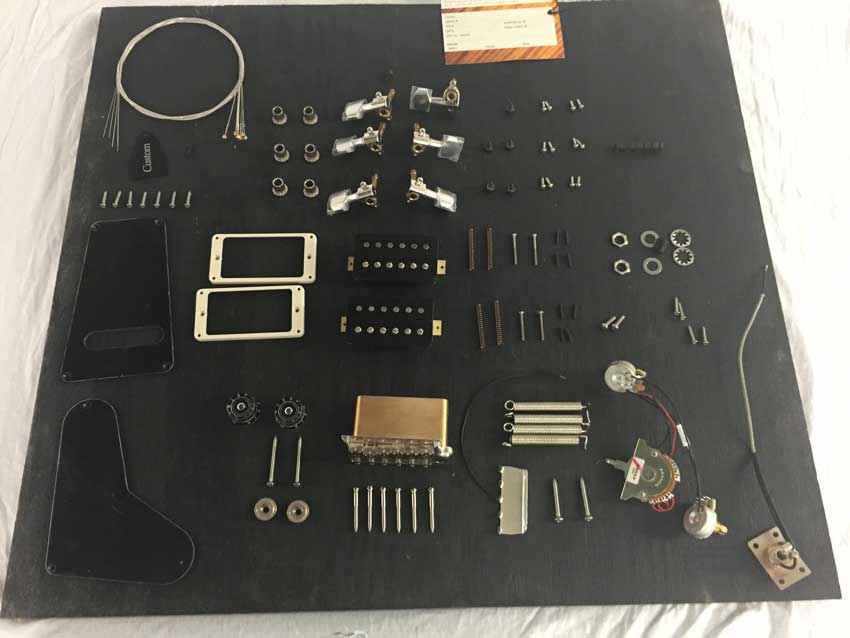 All the hardware that goes into making a PRS guitar. Photo credit: Sergio C.
