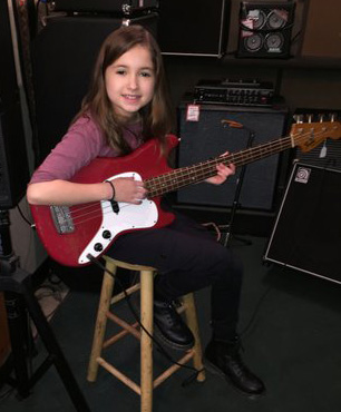 Old school: Evie's vintage Fender Musicmaster bass.