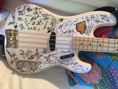 Evie Dolan's Squier Classic Vibe '50s Precision Bass -- signed by her School-mates.