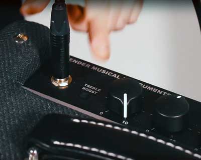 Engaging the Bright switch on a Fender Bassbreaker