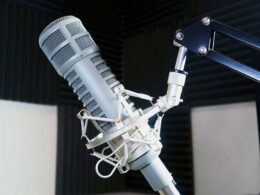 RE20 broadcast microphone mounted on shock suspension on boom arm.