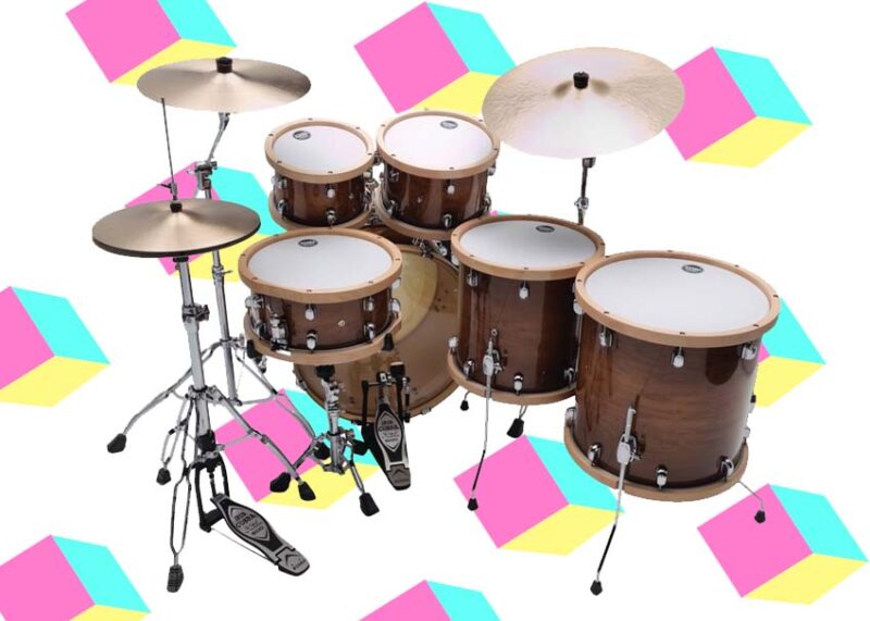 A drum kit with brown shells and cymbals surrounded by pink, cyan, and yellow geometric shapes.