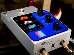 A white and blue Mu-Tron Mutronic guitar effects pedal with colored control buttons and knobs on display.