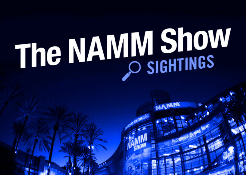 The NAMM Show Sightings text displayed on the illuminated convention center building at night.