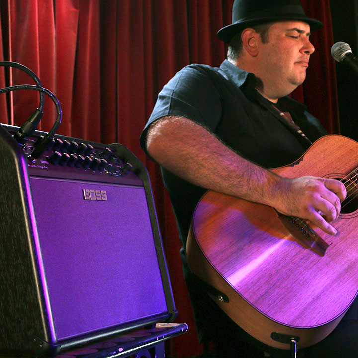 Lloyd Spiegel using a Boss Acoustic Singer amplifier.