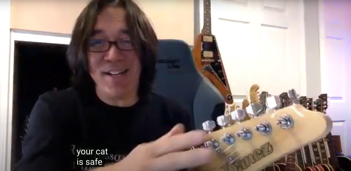 Tomo Fujita shows the tuning machines on an AZ Essentials guitar