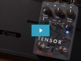 A Red Panda Tensor guitar effects pedal with multiple knobs, switches, and metallic connectors on a dark textured panel.