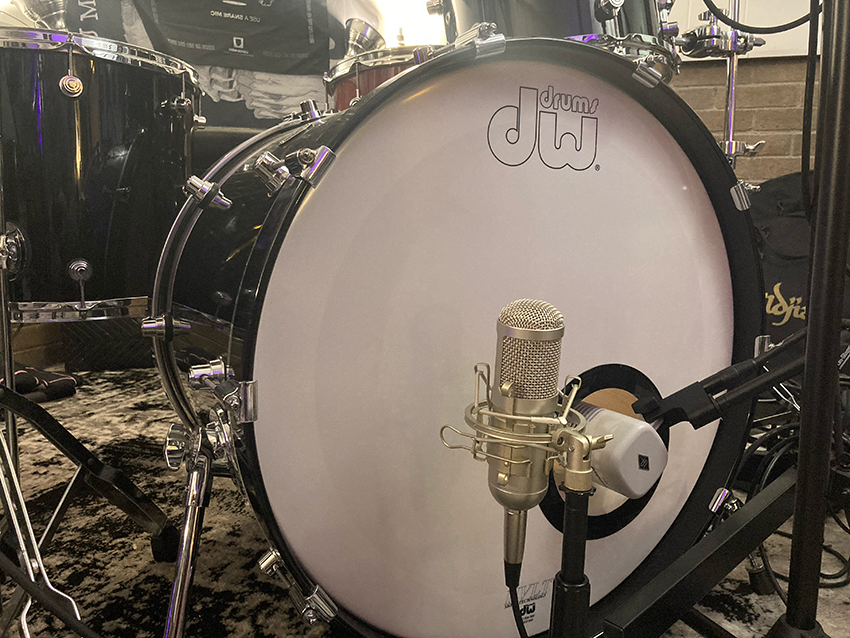 Multiple microphones capturing different aspects of a kick drum. One for the beater attack, one for the resonant head's warmth and sub frequencies.