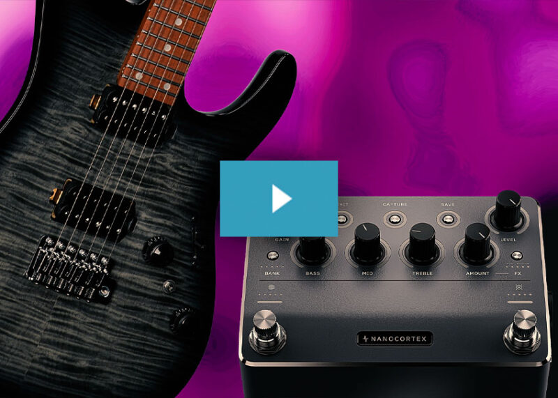 A dark metal electric guitar with a reddish-brown fretboard sits beside a black Nanocortex effects pedal against a vibrant magenta background.