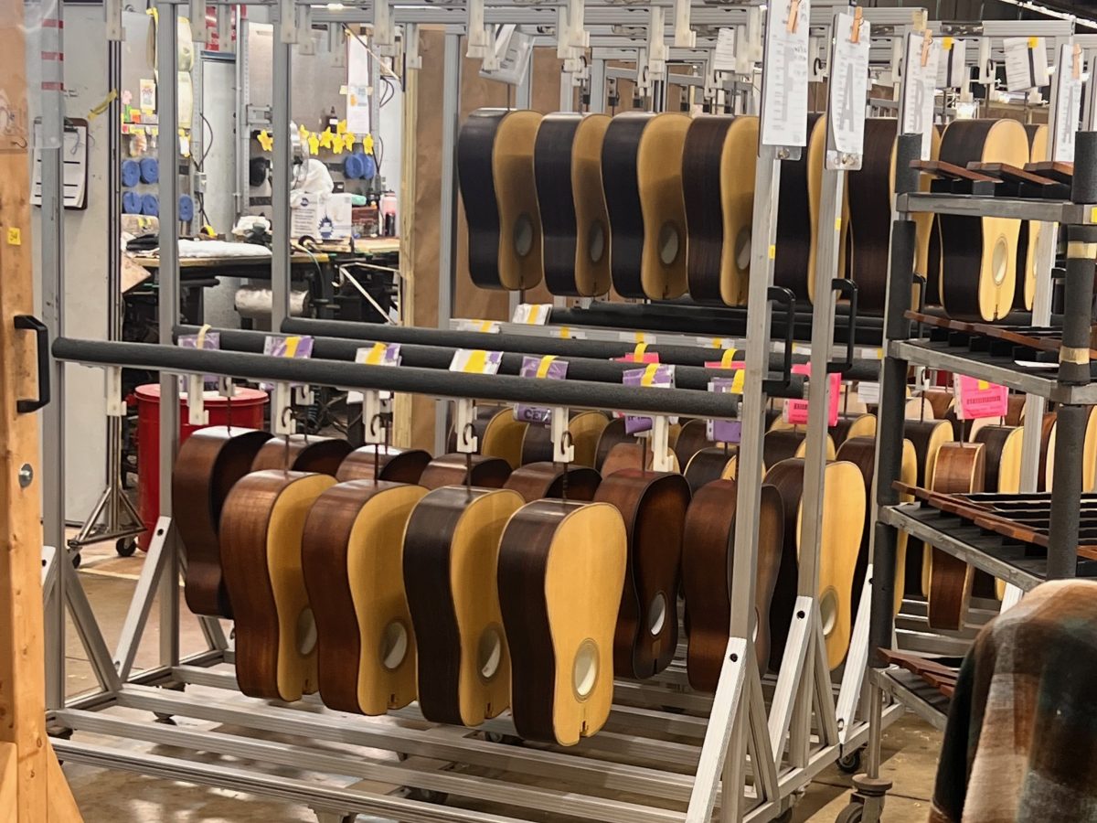 Guitars with drying finishes at the Martin factory.