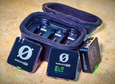 An ope padded microphone case displays two Rode wireless PRO transmitters and one receiver.