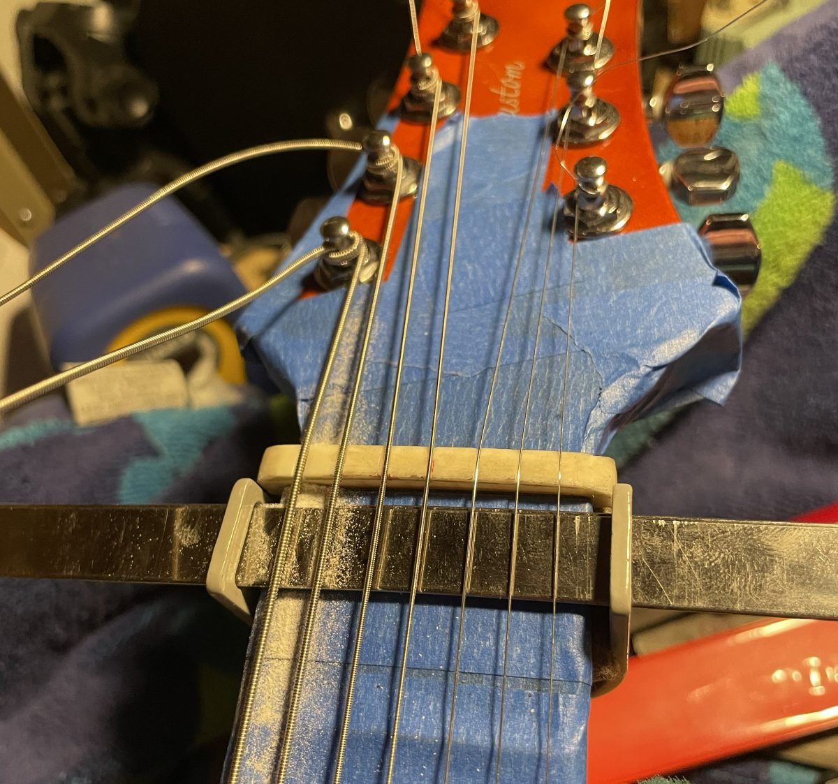 PRS 7-string bone nut being measured