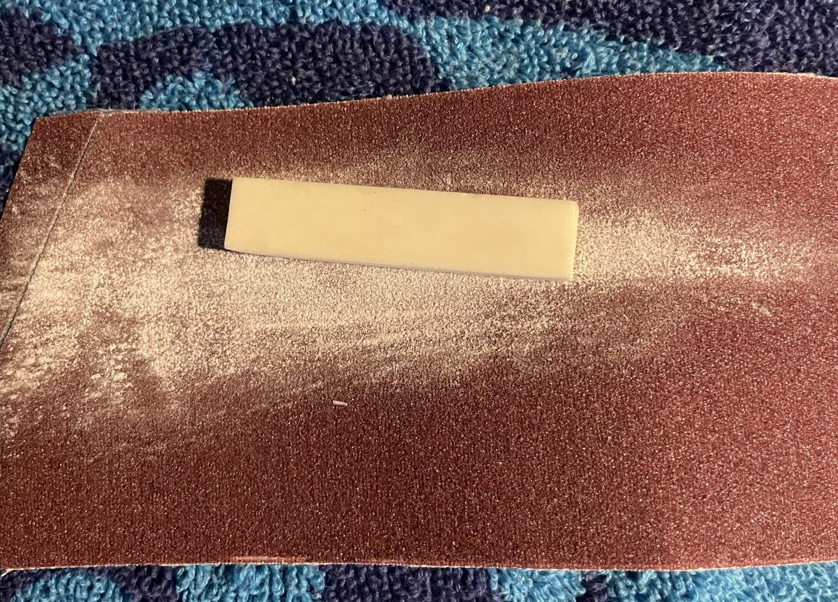 A sanded blank bone nut