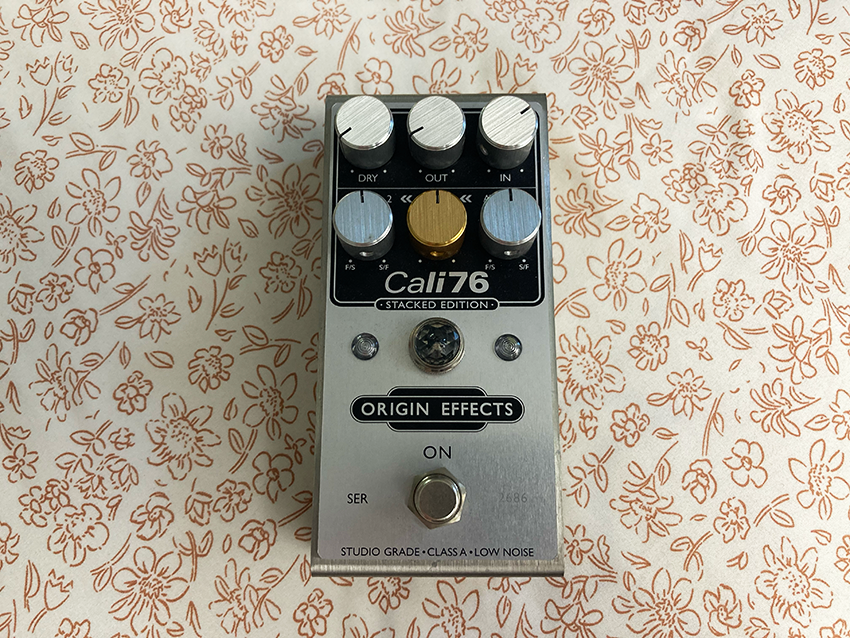 An Origin Effects Cali76 Stacked Edition compressor pedal set to "Always On" or mid-attack settings.